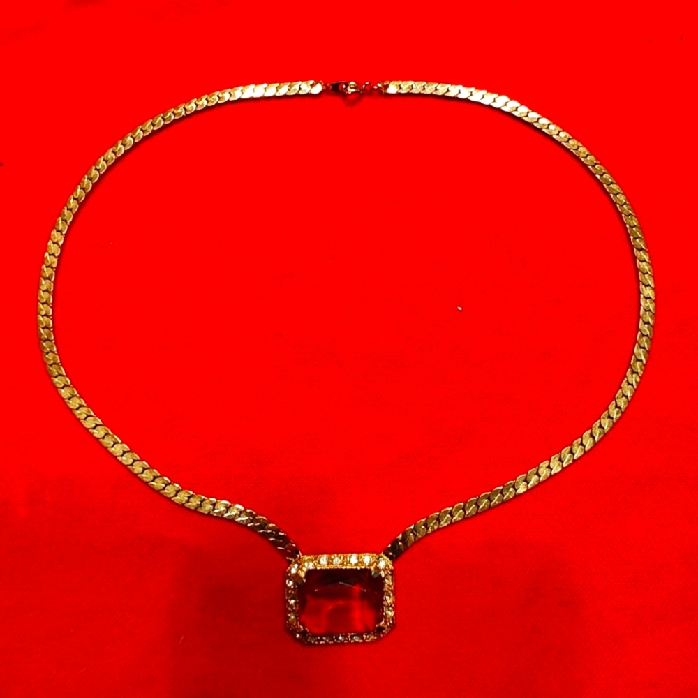 Vintage gold tone choker with center red glass & surrounding  rhinestones.
